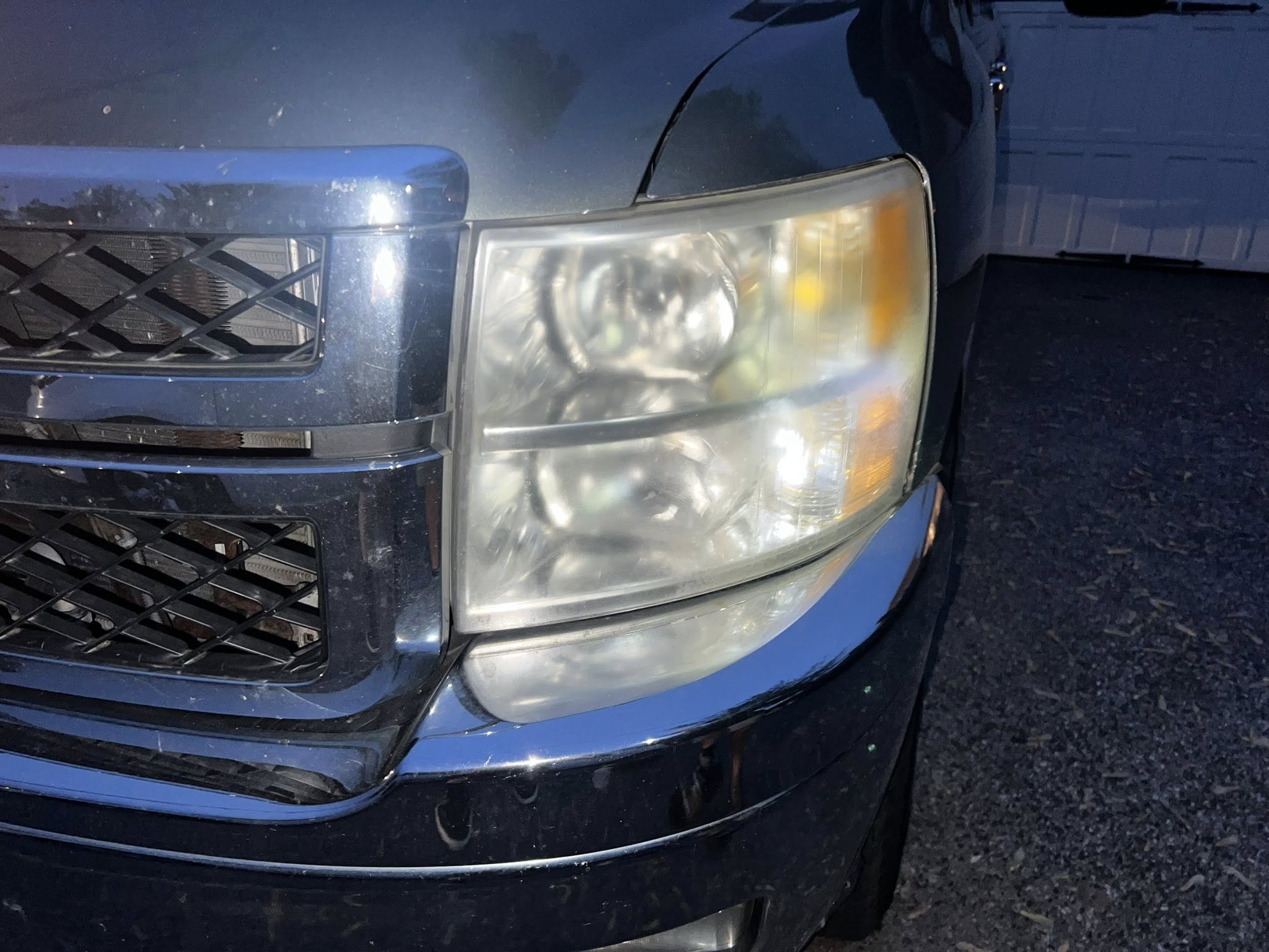 Cloudy headlight before restoration service by mobile car detailing York PA - Krouts Detailing before treatment